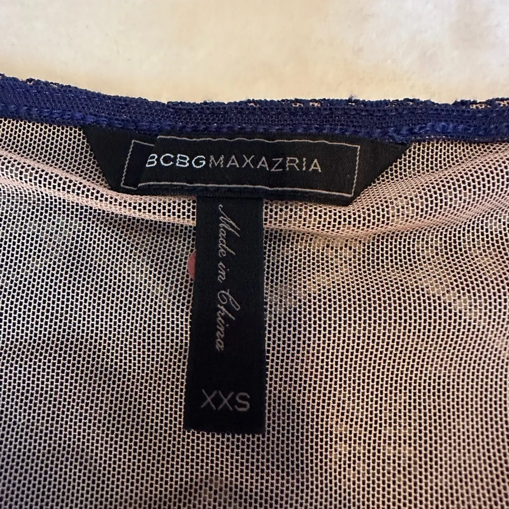 BCBGMaxAzaria Asymmetrical Sleeveless Top ￼ - Picture 2 of 5